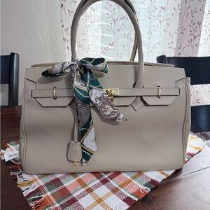 Elegant Beige Handbag with Scarf Accent